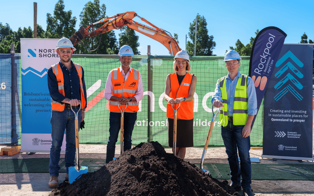 Mel Argent and her team standing in a construction site